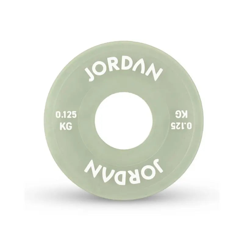 The Jordan Urethane Fractional Change Plate Set features colour-coded Olympic weight plates (0.5kg–2.5kg), including a red 2.5kg plate—ideal for micro-loading and easy weight identification on your barbell. Displayed on a white background.