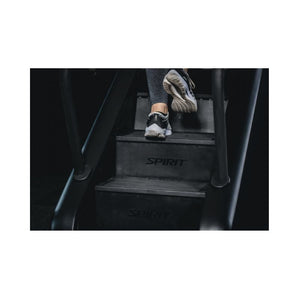 Person using a Stair Climber machine with 'Spirit' branding on a white background