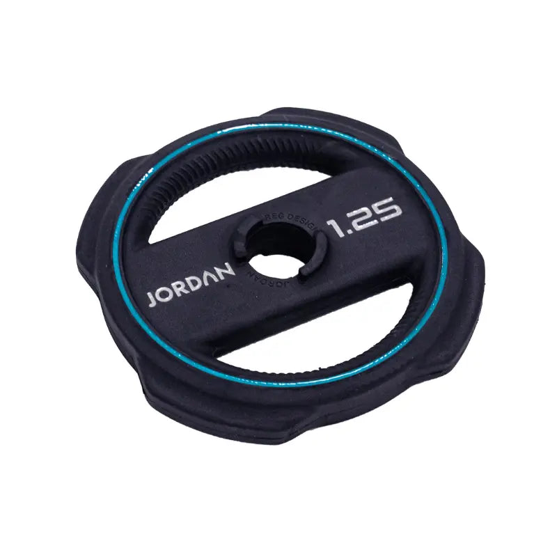 The Jordan Ignite Pump X™ Rubber Studio Set features a black studio barbell with textured grip and labeled round rubber plates, all in a sleek design, studio ready and shown isolated on a white background.