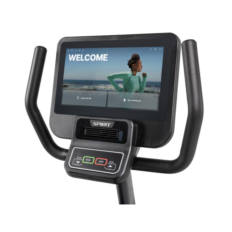 Exercise bike with a digital display showing a welcome screen on a white background
