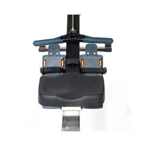 The Attack Fitness Indoor Rowing Machine offers low-impact, full-body cardio with a Bluetooth console and digital display—ideal for home workouts. Shown in black with footrests and flywheel against a white background.