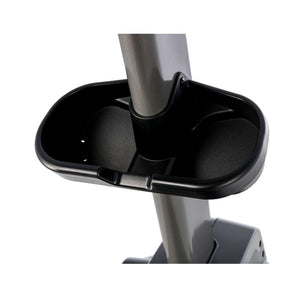 Close-up of a black and grey elliptical trainer cup holder on a white background