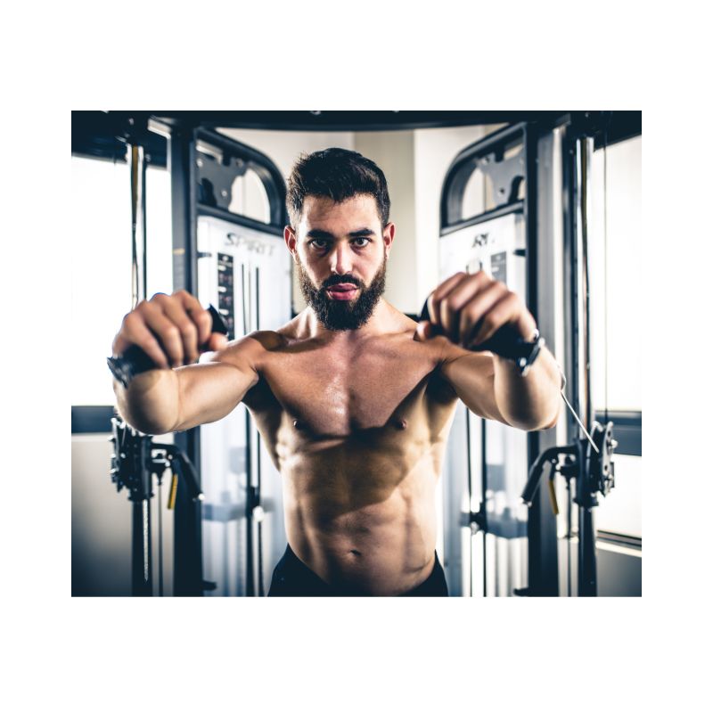 Man exercising with a cable machine  in a gym setting