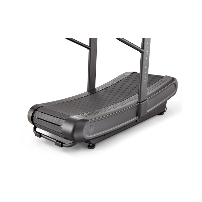 A modern, curved manual treadmill with a black frame and slatted running surface, designed for running or walking without a motor.