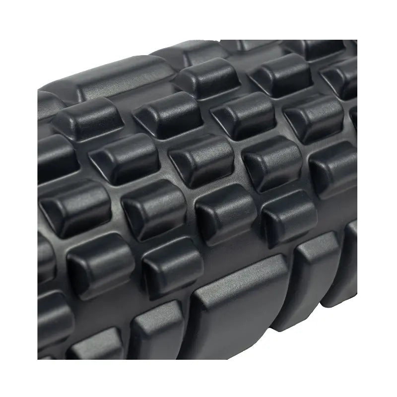 The Jordan Medium-Density Massage Roller – Everyday Foam Roller features a textured black, grid-like surface with Jordan printed in white, perfect for daily recovery and muscle relief. Pictured horizontally on a white background.