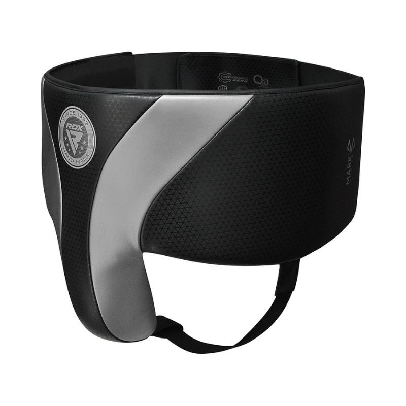 A black and gray RDX brand boxing or martial arts groin protector with padding and an adjustable strap, shown against a white background.