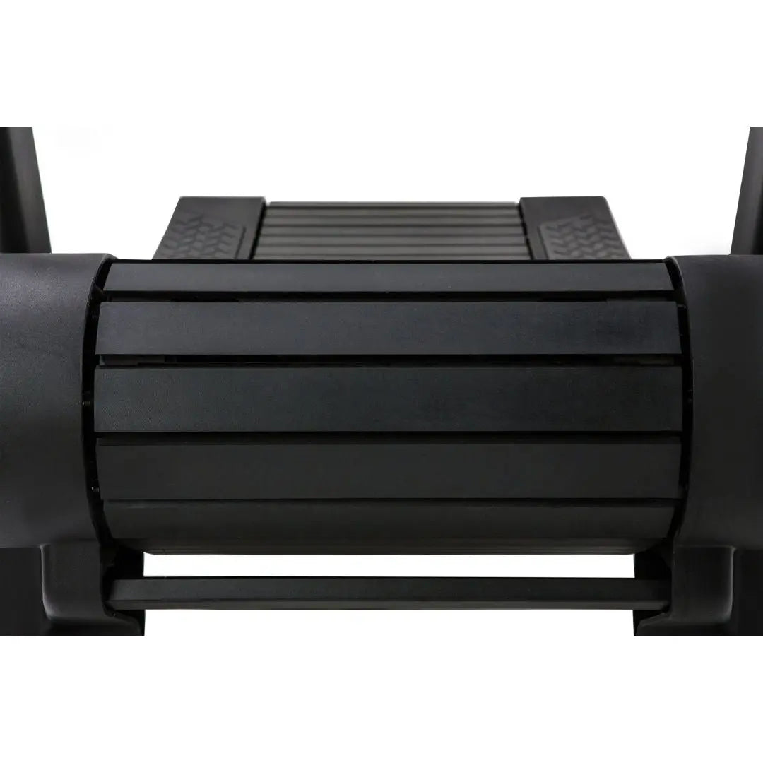 The ATTACK FITNESS - Run Attack curved treadmill in sleek black features dual handrails and a digital display. Its self-powered design optimizes running, with Attack Fitness prominently displayed on the frame.