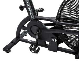 The Attack Fitness Air Attack Bike is a commercial air resistance cardio machine featuring a large fan wheel, upright handles, pedals, and an adjustable seat for intense full-body indoor workouts.