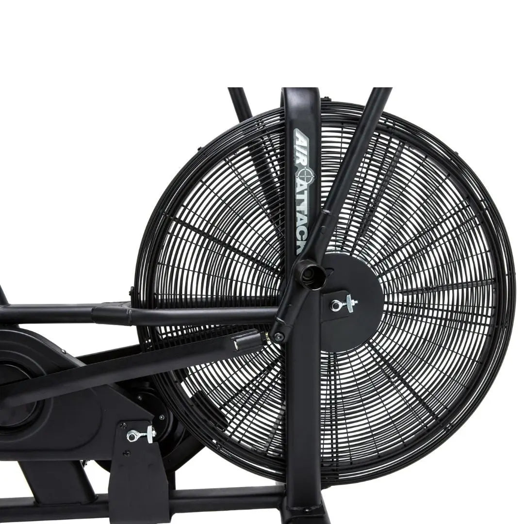 Introducing the ATTACK FITNESS - Air Attack: a black air resistance exercise bike ideal for home workouts. It features a large front fan wheel, dual handlebars, and an adjustable seat for full-body workouts. Built robustly by Attack Fitness, it’s perfect for high-intensity exercise sessions.
