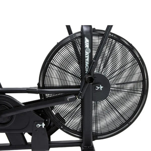 The Attack Fitness Air Attack Bike is a commercial air resistance cardio machine featuring a large fan wheel, upright handles, pedals, and an adjustable seat for intense full-body indoor workouts.