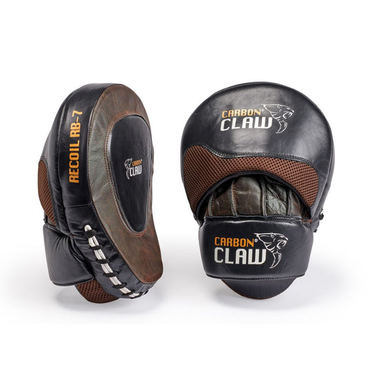 The CARBON CLAW - RECOIL RB-7 hook & jab pads boast a sleek claw logo, black and brown leather design, and RECOIL RB-7 text. These premium boxing pads, with a rounded shape and mesh detailing, enhance performance in training.