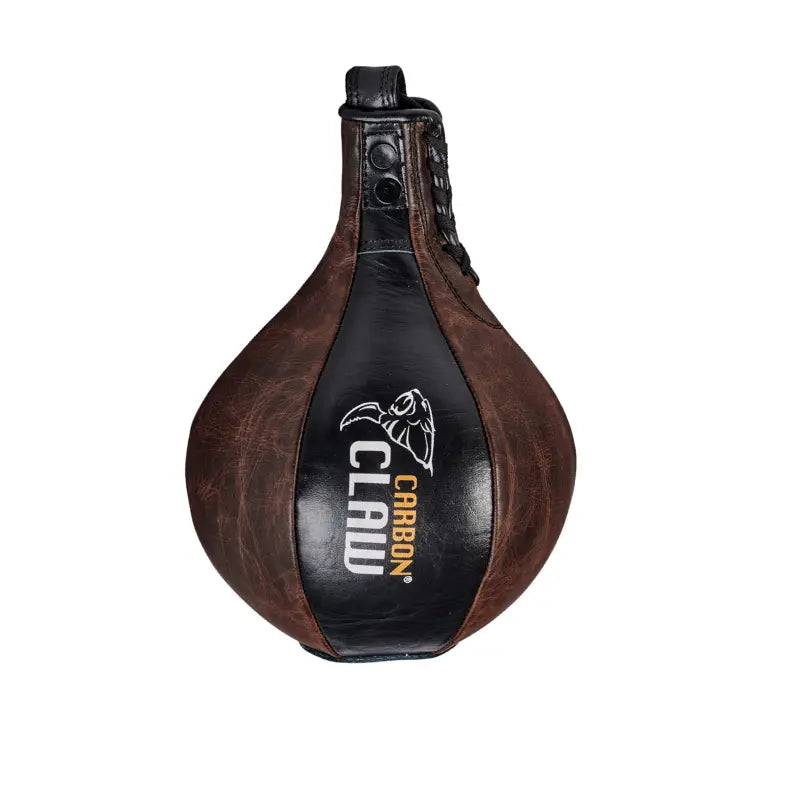 The Carbon Claw RB-7 Leather Speedball – 8” is a brown and black premium cowhide ball with visible stitching and branding, ideal for boxing reflex training and professional use, shown isolated on a white background.