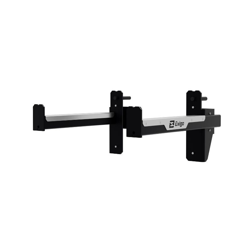 Exigo X70 External Safety Spot Arms (Pair) are black and silver, wall-mounted brackets for supporting gym equipment or heavy objects, featuring the Exigo logo and providing added lifting protection.