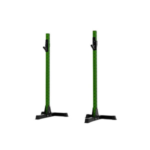 Two green Exigo X70 Free Standing Squat Stands by Exigo, each with a black base, multiple adjustment holes, and safety hooks, are shown upright on a white background—ideal for heavy barbell training in home gyms.