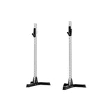 The Exigo X70 Free Standing Squat Stands by Exigo feature black bases and multiple height adjustment holes—perfect for heavy barbell training in your home gym.