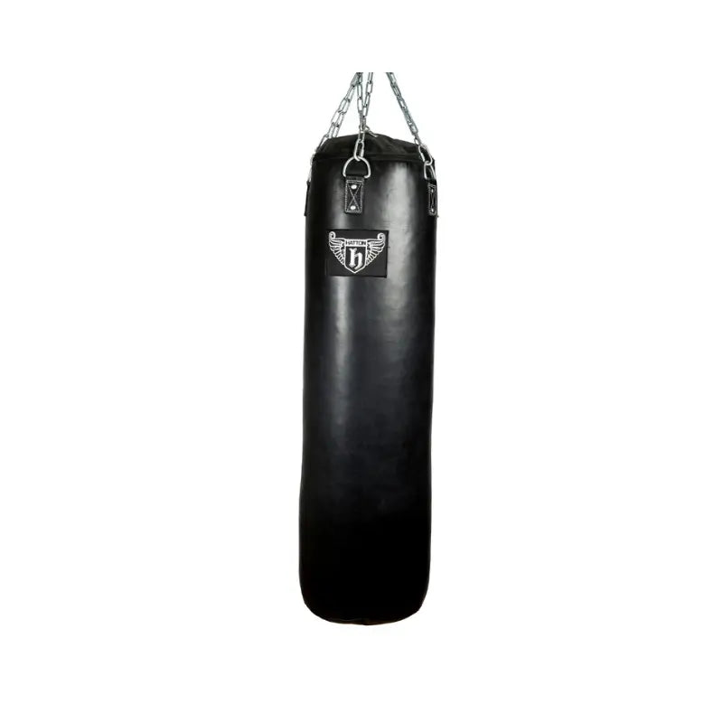 The HATTON BOXING Heavy Bag, hanging from metal chains against a white background, is ideal for boxing training and displays the Hatton logo with an “H” and wings on the front.