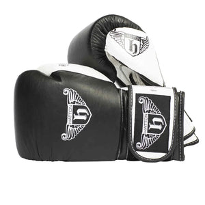 HATTON BOXING Velcro Sparring Gloves Leather, featuring the Hatton logo and a stylized H. These sleek black-and-white gloves include intricate white detailing, perfectly positioned for any boxing routine.