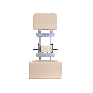 The HEGREN TALMA Accessory Storage Rack by Hegren features a beige metal frame and padded supports—perfect for organizing your studio or pairing with Pilates equipment, shown here against a white background.
