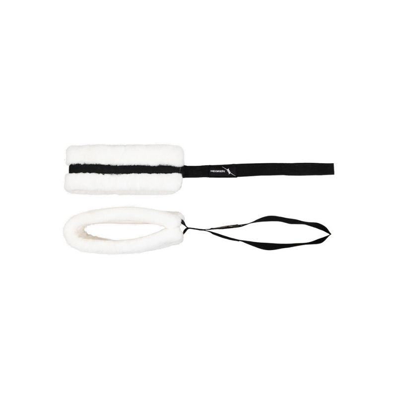 The HEGREN Fuzzy Straps by Hegren are white, fluffy rectangular pads with black double loop handles, shown from two angles. These soft Pilates straps are Cadillac Tower compatible and ideal for workouts or cleaning tasks.