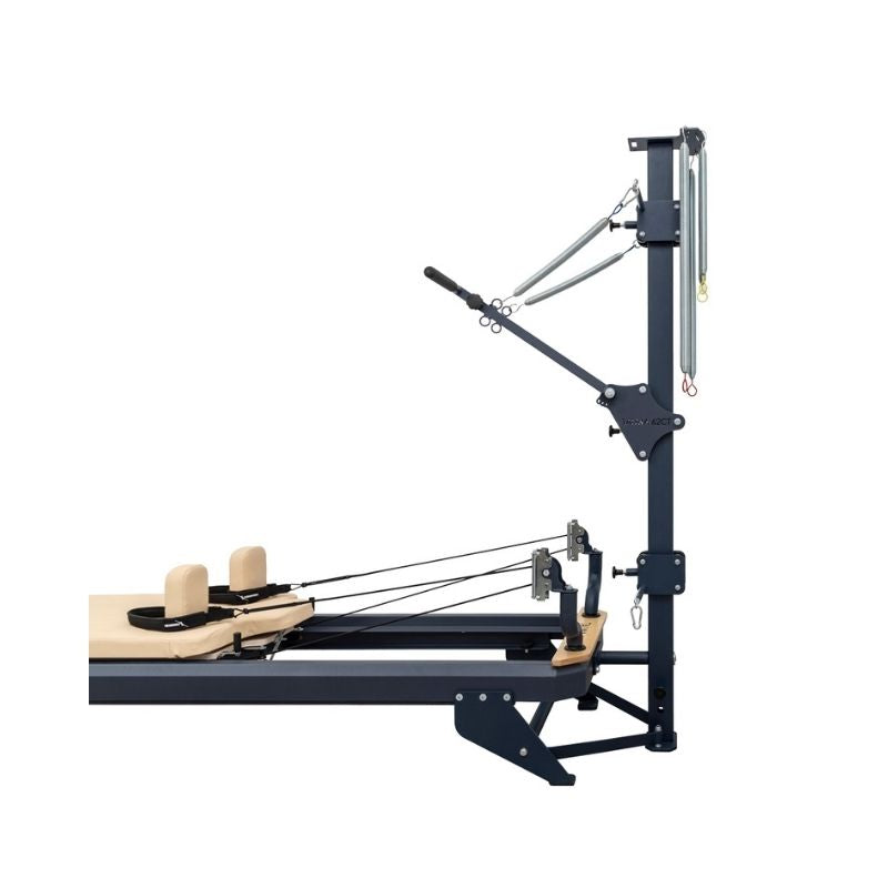 The Hegren TALMA 62CT Convertible Pilates Tower offers studio-grade performance with adjustable pulleys, ropes, handles, and a padded wooden platform and headrests for versatile resistance training and exercises.