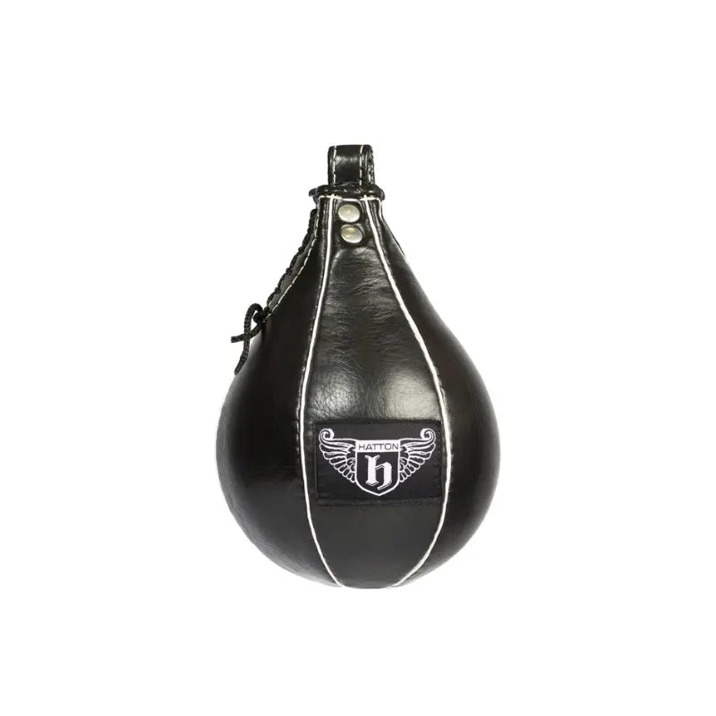 The HATTON BOXING Speedball by Hatton is a black leather speedball with white stitching and a winged h logo on the front. Ideal for boxing training and improving hand speed. Shown isolated on a white background.
