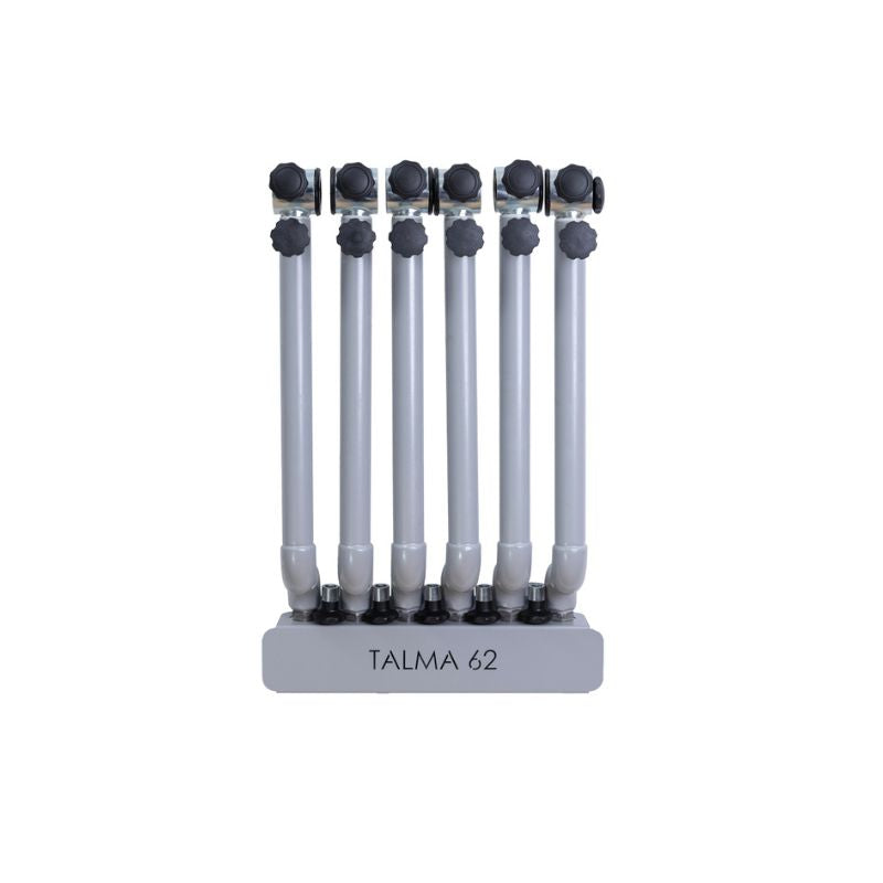 The HEGREN Stability Bar Wall Rack by Hegren features six vertical white cylindrical tubes with black knobs on a rectangular base labeled TALMA 62. Ideal for Pilates studio storage, it is shown against a plain white background.