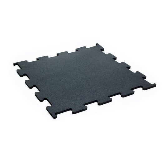 The JORDAN - ACTIV Gym Flooring Interlocking Mats - Black by Jordan are black rubber tiles with a textured surface, designed to connect seamlessly like puzzle pieces. Perfect for noise-reducing gym flooring, these tiles are set against a plain white background.