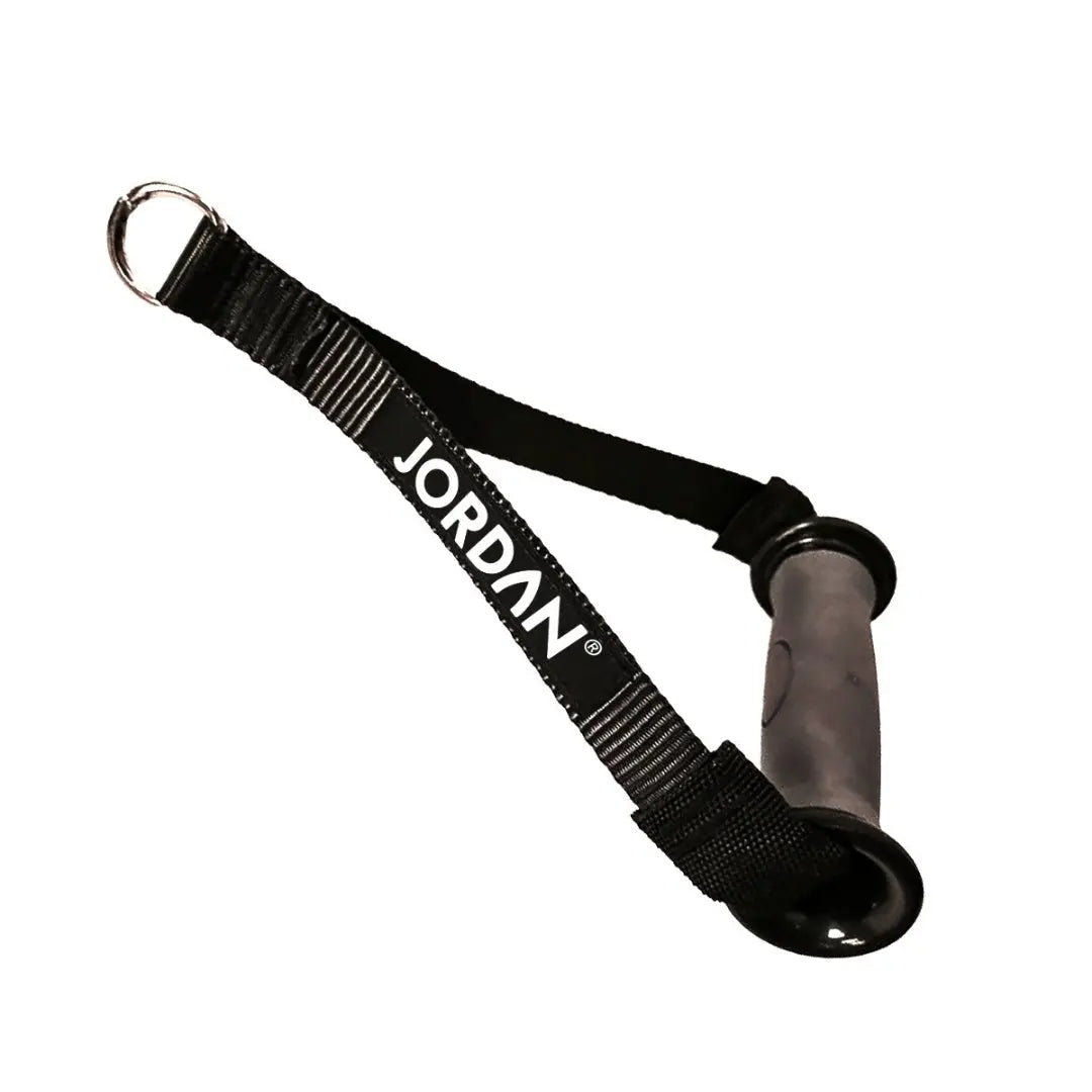The JORDAN Soft Cable Handle features a black fabric strap with a padded grey grip and metal D-ring, ideal for dual pulley machines. Jordan is elegantly printed in white on the handle.