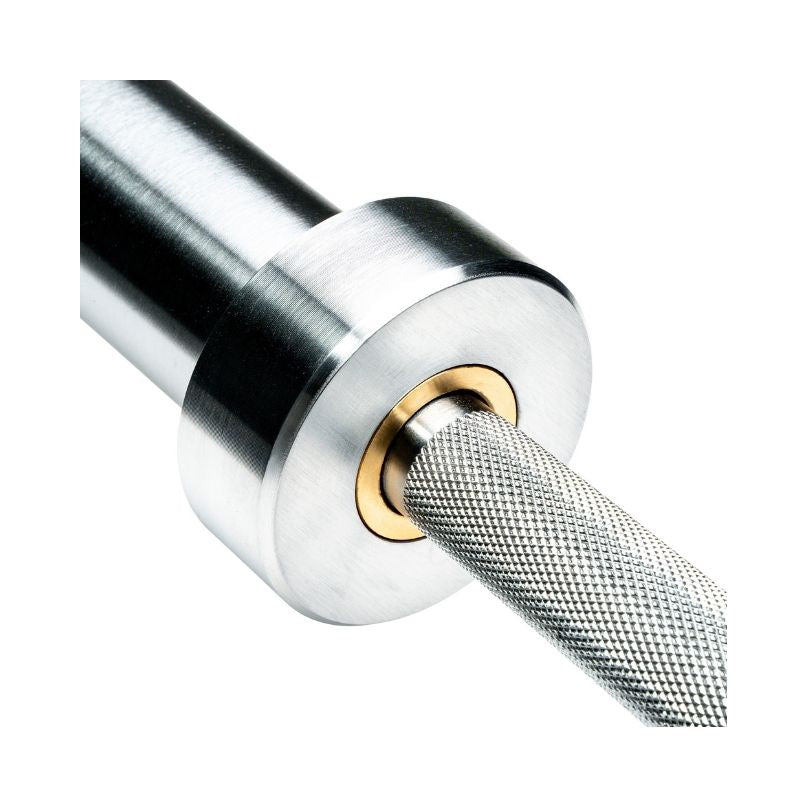 Close-up of the Jordan Ultimate Olympic Bar, a competition-standard men’s or women’s barbell (15kg/20kg) with textured knurling and smooth collar, built to 200K PSI—ideal for serious weightlifting or strength training.