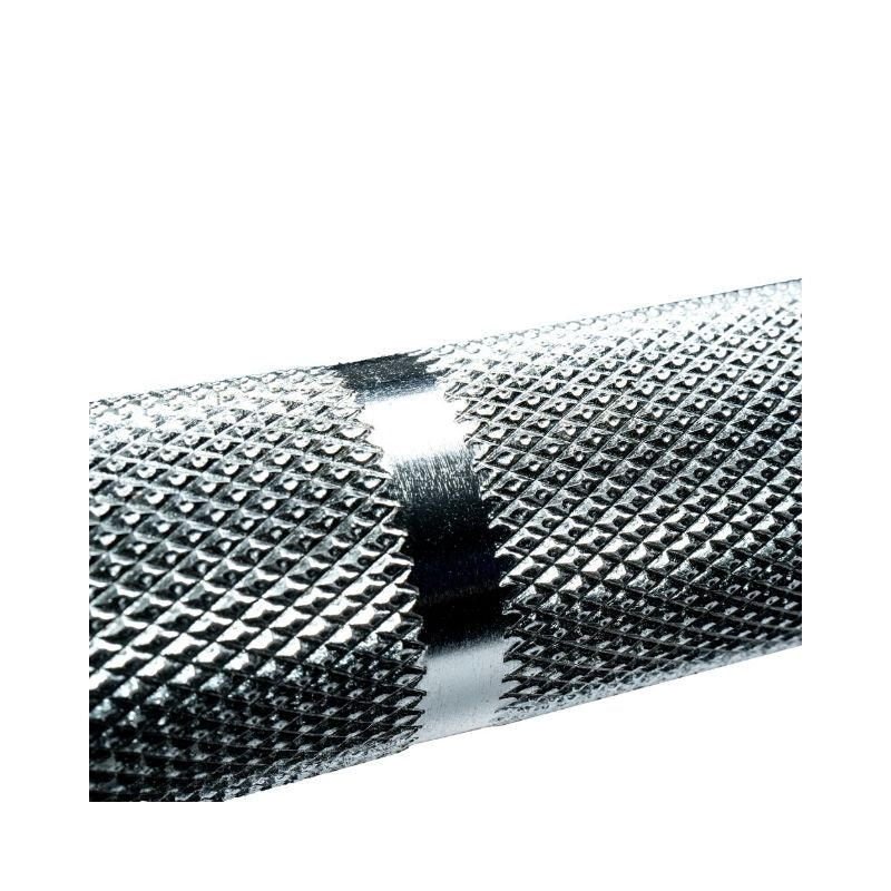 Close-up of the JORDAN Ultimate Olympic Bar by Jordan, a competition-standard 15kg/20kg barbell with diamond-patterned knurling for grip, smooth center ring, and 200K PSI tensile strength, shown on a plain white background.