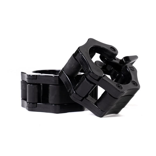 A pair of MYO Strength Quick Lock Collars by MYO Strength, designed for securely holding weight plates on barbells during strength training; one collar is upright while the other leans against it.