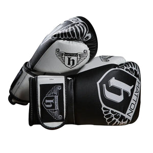 The sleek HATTON BOXING Boxing Gloves PU in black and white, featuring the Hatton brand and a winged logo, are shown overlapping against a white background.