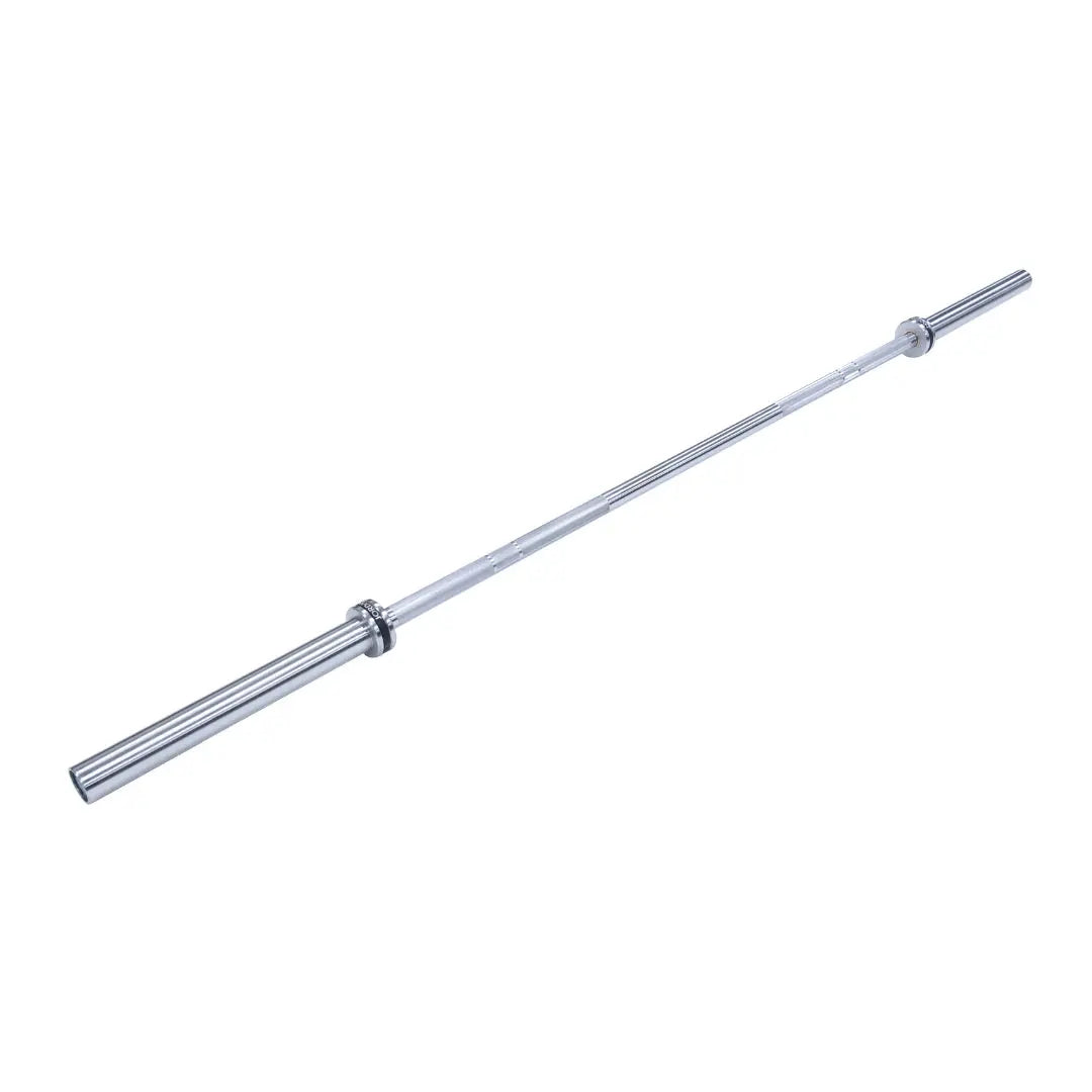 Close-up of the end of a JORDAN Elite Steel High Performance Olympic Bar. The circular cap says JORDAN, 1FT ELITE BAR, ENGLAND, and ESTD 1989 with specs 20KG-28MM. Ideal for Strength Training or Competition, the barbell is horizontally set against a white background.